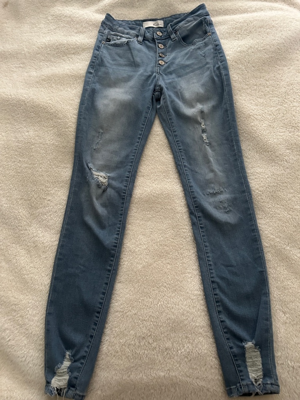 Light Wash Distressed High-Rise Skinny Jeans